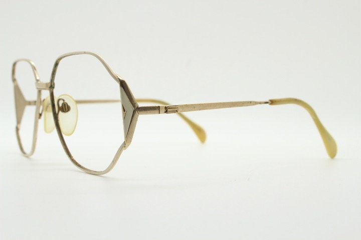 Silhouette 70s vintage octagon eye glasses. Womens sophisticated angular golden optical frame with white detail. Prescription eyeglasses. Rx