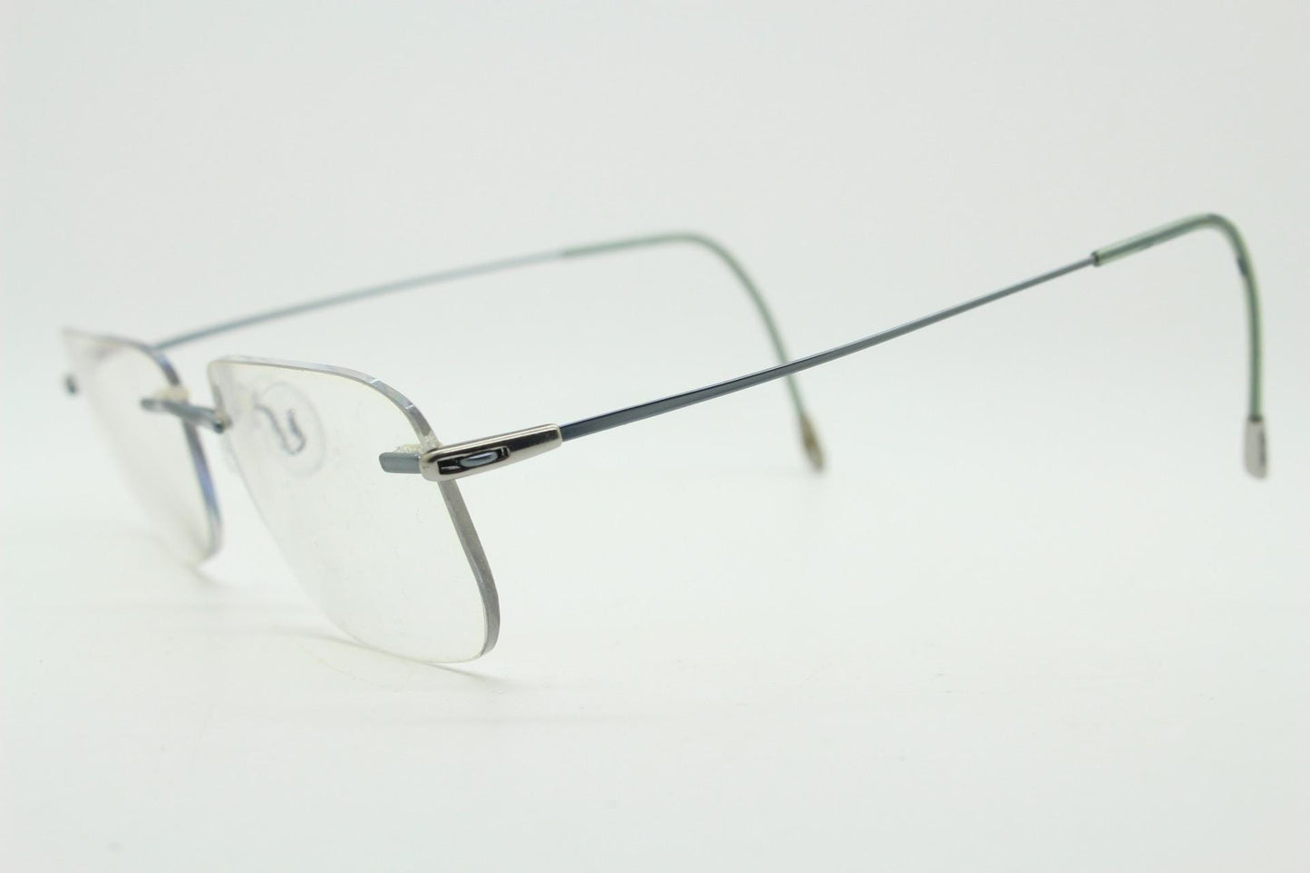 Silhouette rectangular frameless eye glasses model 7554 made in Austria. Minimal lightweight titanium optical frame. Prescription RX