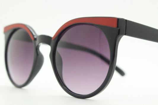 Vintage 80s flat top cat eye sunglasses. Womens black cateye with red brow and graduating smoky lenses. Rockabilly pin up. NOS catseye