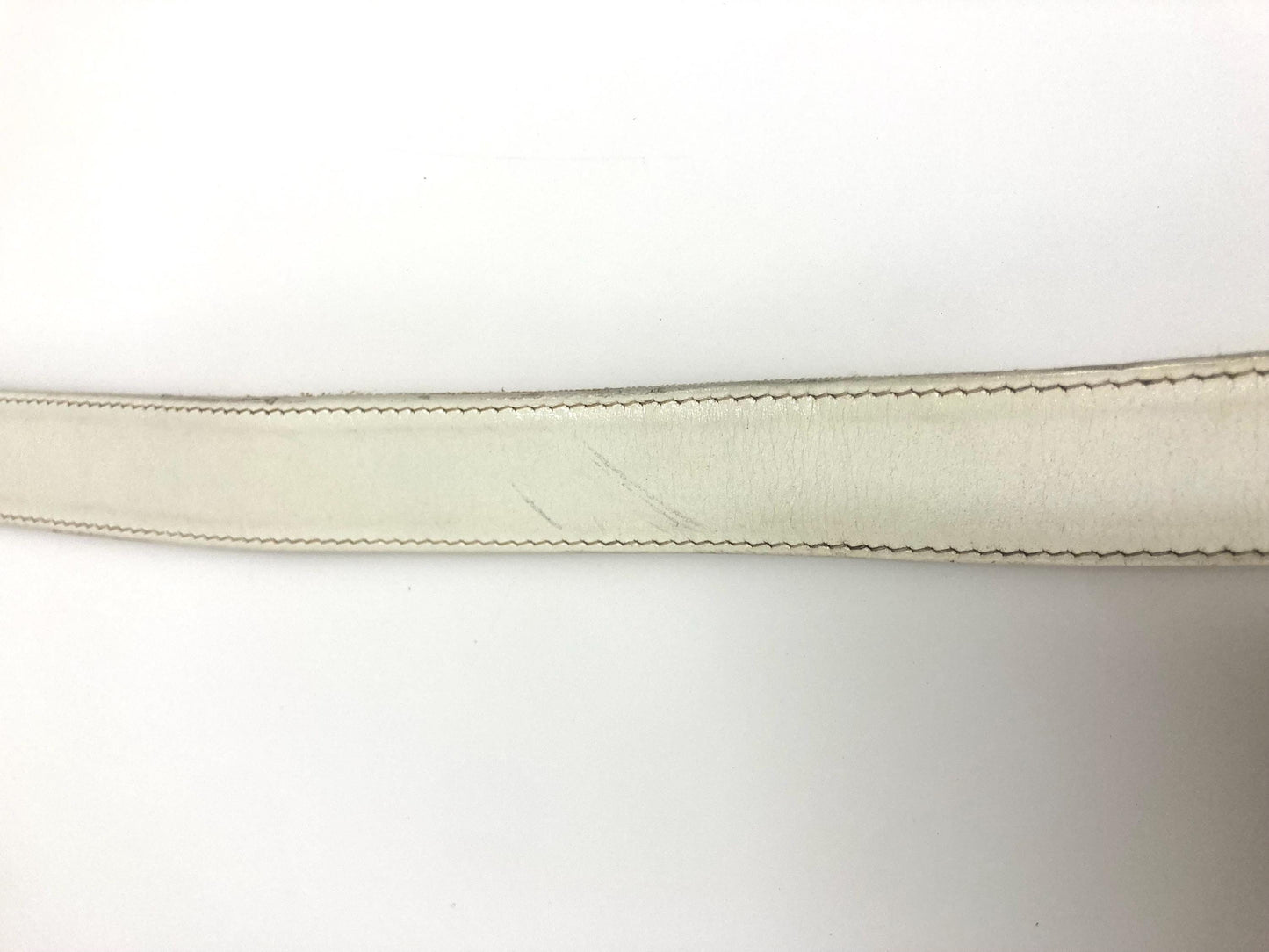 90s vintage womens dress or jeans belt by French Connection. Plain white genuine leather with chrome solid brass buckle. Made in England