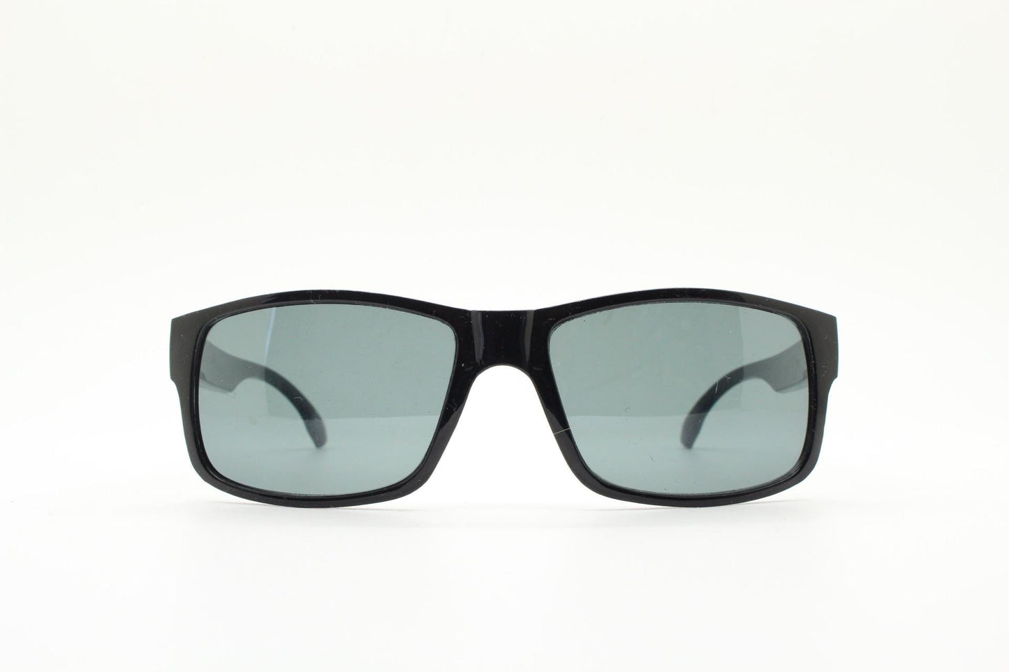 Y2K vintage sharp rectangular sunglasses. Large curved black gloss frame with dark green lenses and silver arrow arm crests. NOS