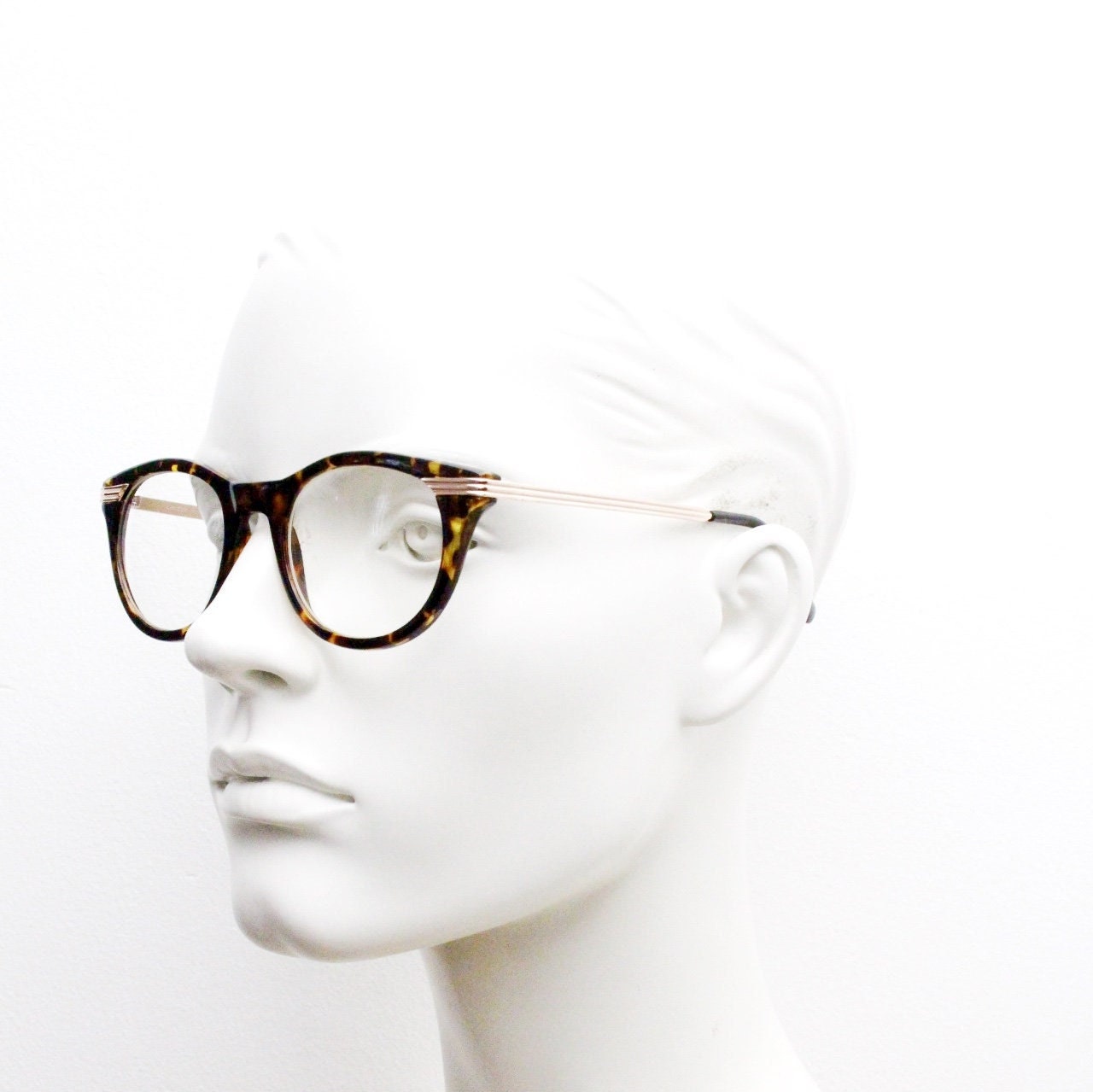 90s vintage cat eye glasses in tortoise with gold metal arms. 50s, 60s style cateye prescription optical frames. Clear lens eyeglasses. RX