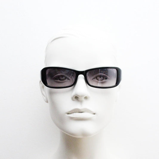 90s vintage rectangular curved wraparound sunglasses. Womens aerodynamic quality black acetate cat eye frame. Minimal shield design. NOS