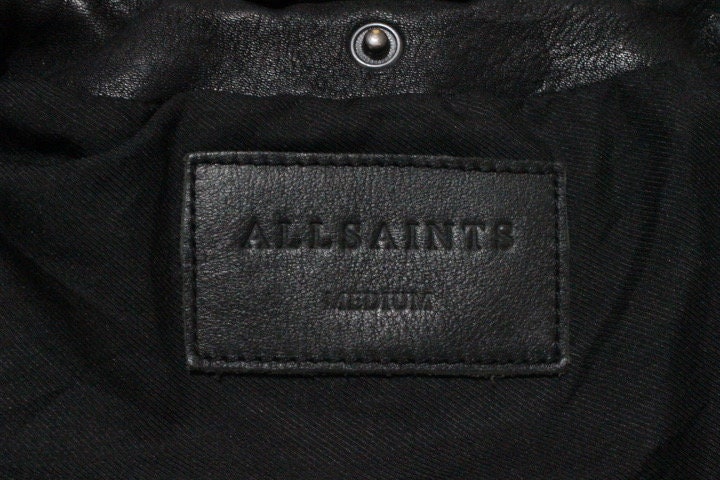 Allsaints black motorcycle jacket with. Genuine lambs leather hip length biker with fixed adjustable belt. BNWOT. Over 30% sale rrp 469 GBP