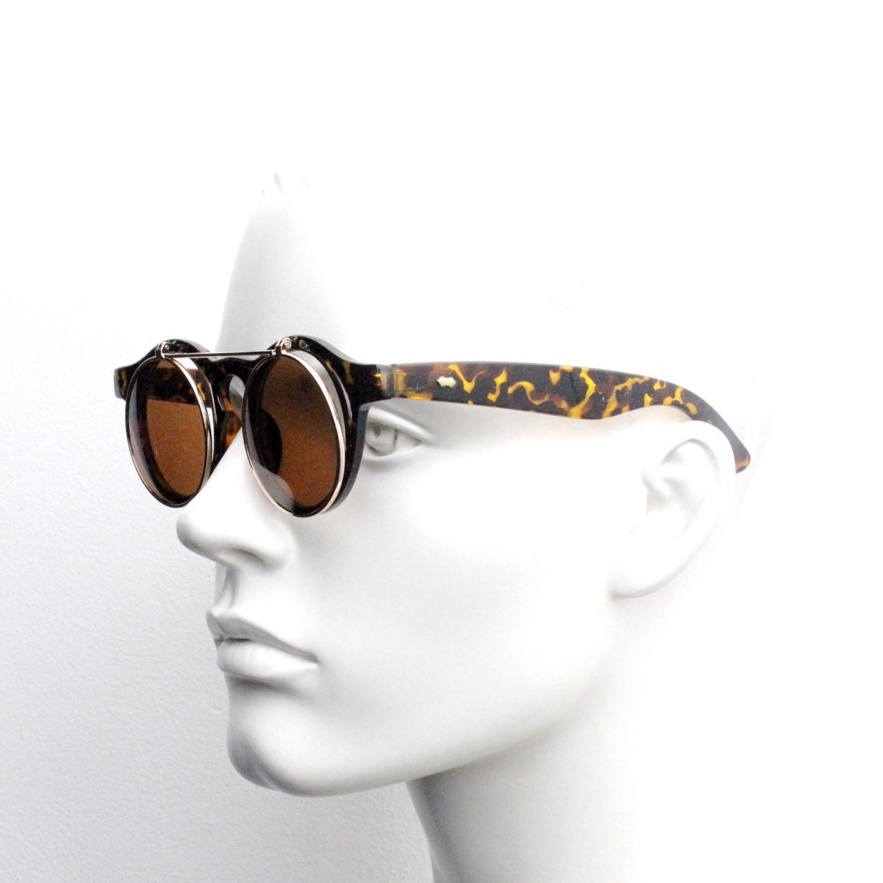 Vintage 90s round flipper sunglasses. 30s style tortoise frame with clear lenses and flip up sunglasses visor. BNWT unused