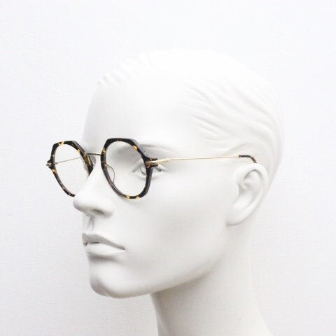 Kaleos hexagon eye glasses model Trevethyn made in Italy. Amber tortoise acetate optical frames with gold arms. Prescription eyeglasses. RX