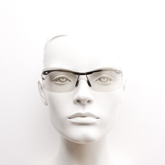 Y2K vintage visor sunglasses. 2000's wrap around sport shield design. Brown chrome brow with light tone lens. NOS 00's. 90S