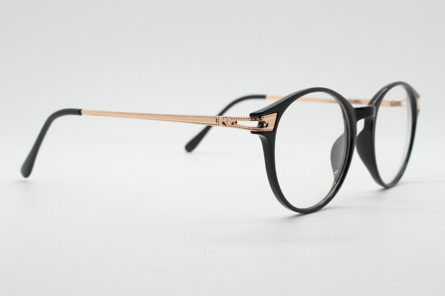 90s vintage round glasses with embossed gold  arms. Black 40s, 50s style prescription optical frames. Clear lens eyeglasses. RX spectacles
