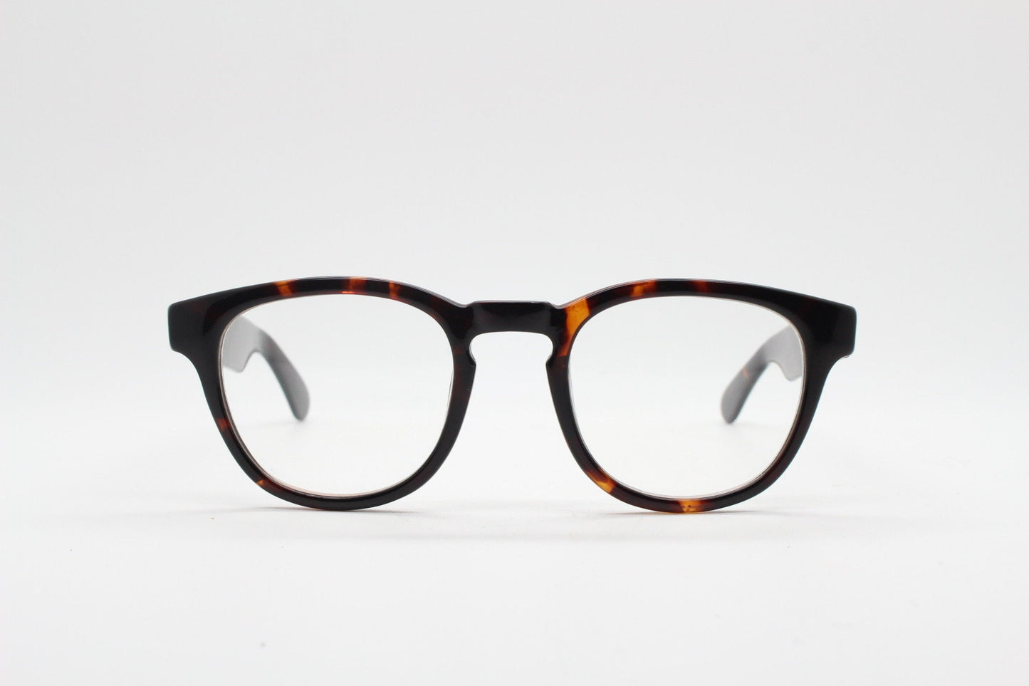 80s vintage modified wayfarer style glasses. Tortoise optical frames with keyhole bridge and clear lenses. 40s, 50s style NOS eyeglasses