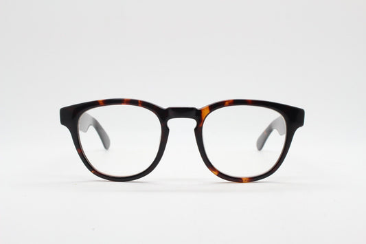 80s vintage modified wayfarer style glasses. Tortoise optical frames with keyhole bridge and clear lenses. 40s, 50s style NOS eyeglasses