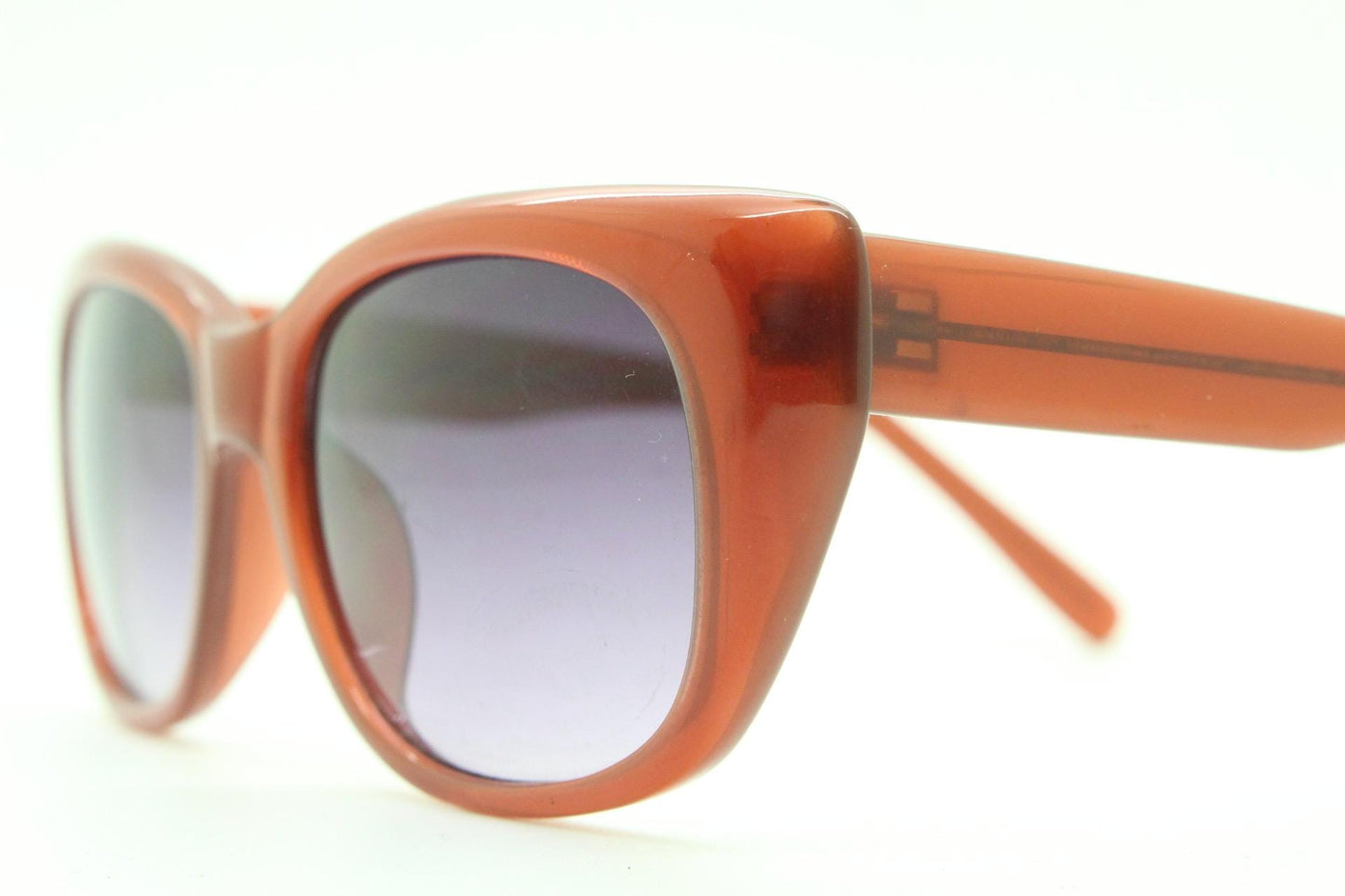 Vintage 90s rectangular cat eye sunglasses. Womens transparent brown acetate cateye in sensible proportions with graduating lenses. NOS