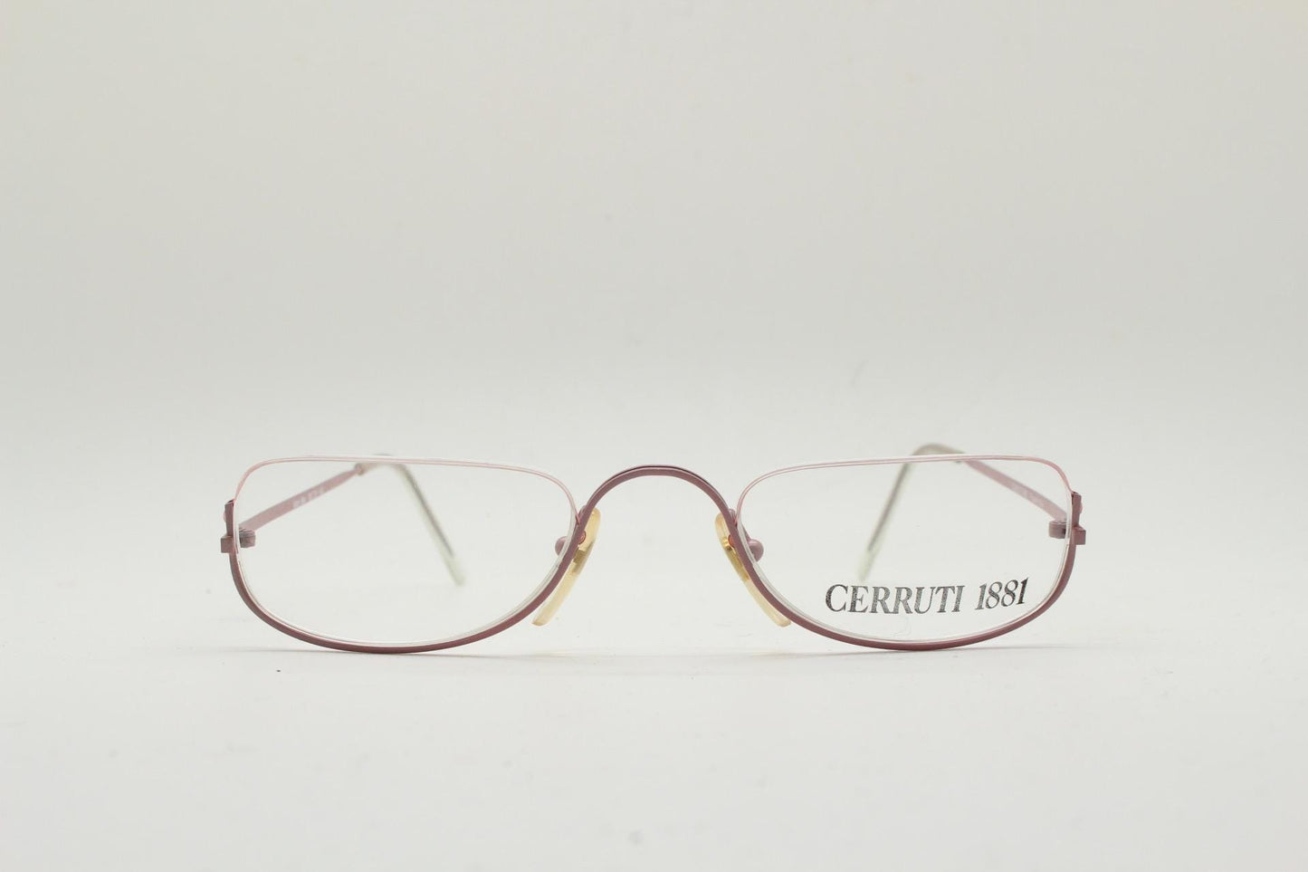 Cerruti 1881 half moon eye glasses. Pink half frame optical eyeglasses. Undulating C bridge design. 90s vintage prescription spectacles. NOS