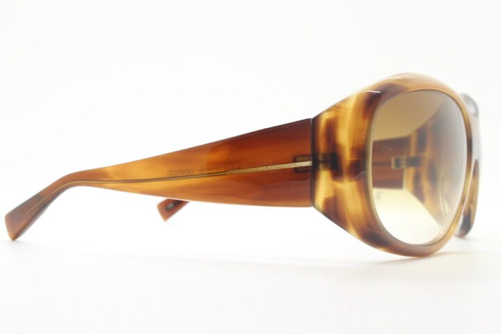 Oliver Peoples vintage Y2K wrap around sunglasses model Vanadis made in Japan. Big bug eye with tall arms in mottled brown acetate frame