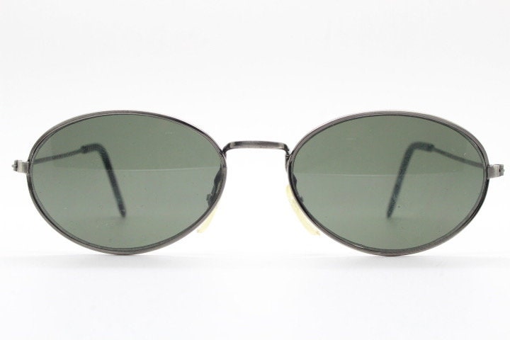 90s vintage metal oval sunglasses. Minimal brushed bronze finish brown frame with plain green lenses. Steampunk. Unused NOS