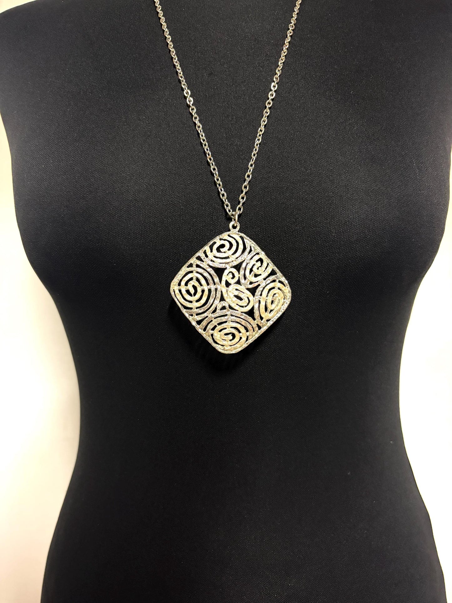 60s vintage large silver square pendant necklace made in England. Satin and matt finish with swirling paisley cut out shapes. Womens. NOS
