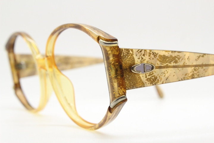 Christian Dior 70s vintage round eye glasses. Transparent honey colour optical frame with abstract gold sparkle patterns. Prescription RX