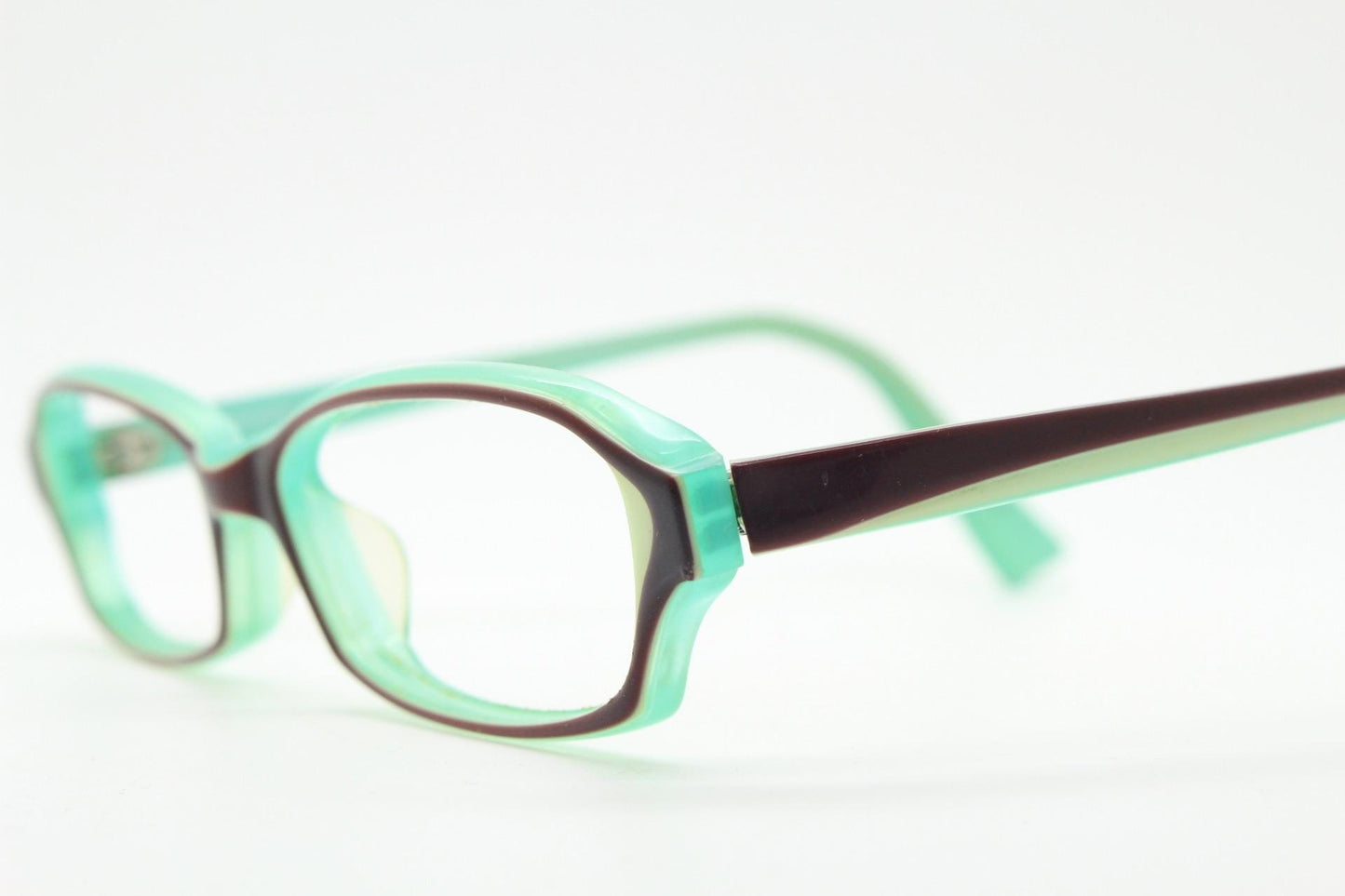 Francois Pinton Paris rectangular cat eye glasses made in Italy. Womens vibrant green acetate optical frames with brown front. Vintage