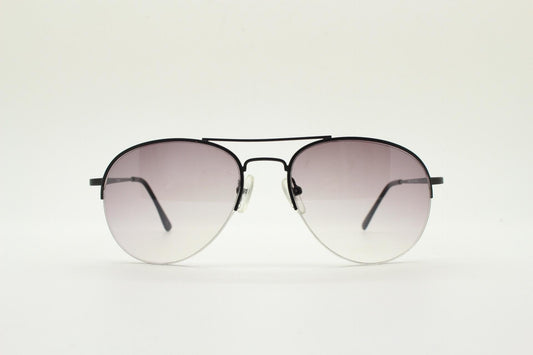 90s vintage medium sized pilot aviator sunglasses. Minimal black satin finish half frame with superb smoky lenses. Teardrop aviators.  NOS.