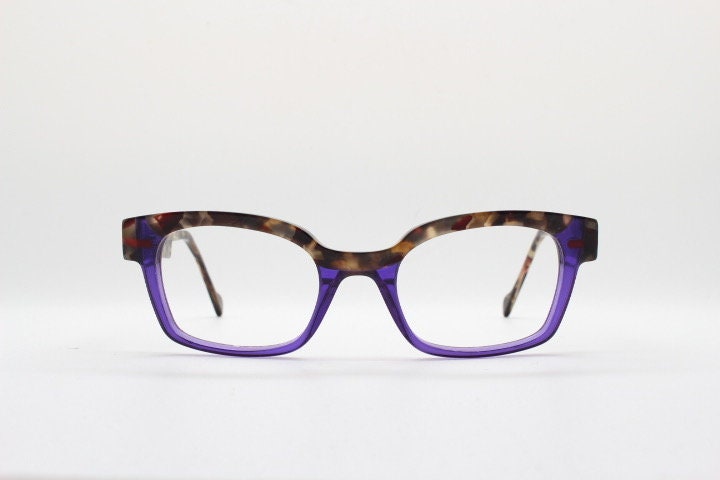 Anne et Valentin rectangular eye glasses made in France model 1330. Marbled tortoise acetate optical frame with purple tone. Prescription RX