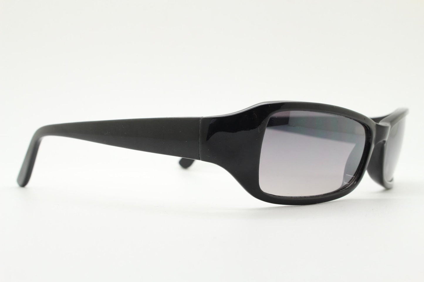 90s vintage rectangular curved wraparound sunglasses. Womens aerodynamic quality black acetate cat eye frame. Minimal shield design. NOS