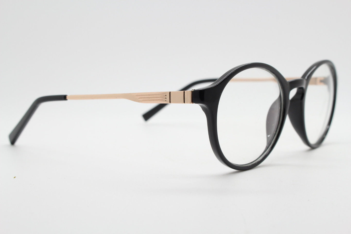 90s vintage round glasses. 30s, 20s style black optical frames with gold arms. Prescription eyeglasses with clear lenses. RX spectacles. NOS