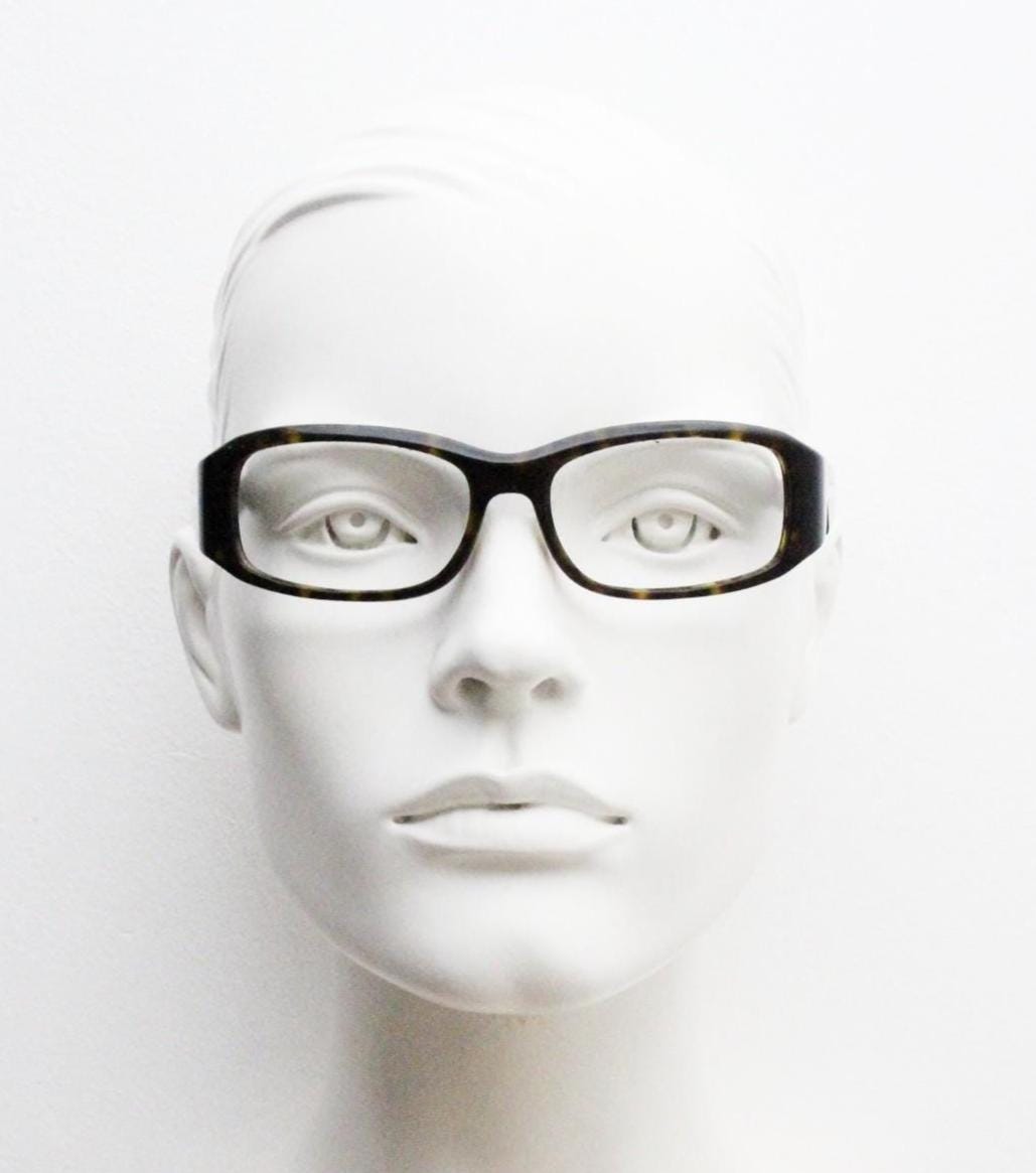 Prada rectangular wrap around eyeglasses made in Italy. Tortoise curving acetate optical frame with tall arms. Vintage prescription glasses