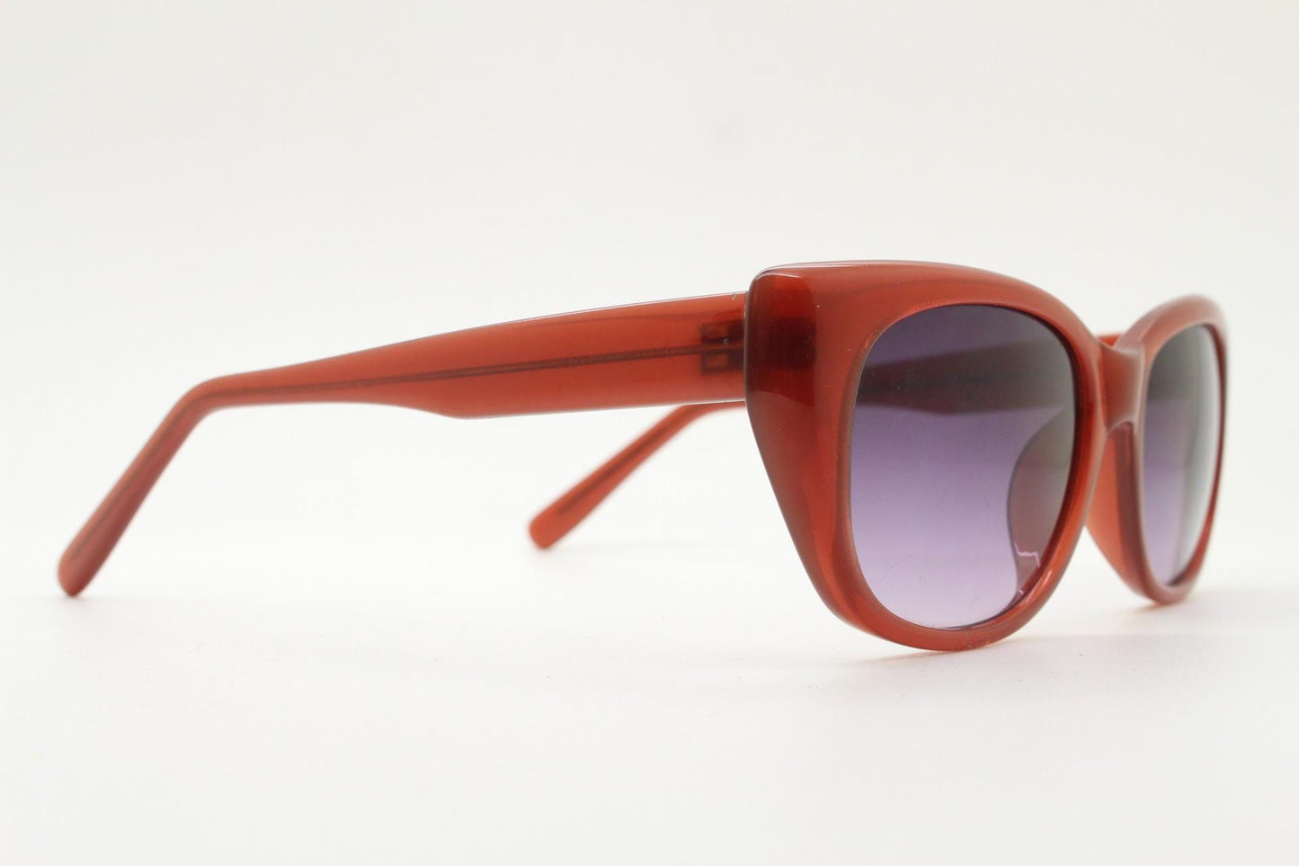 Vintage 90s rectangular cat eye sunglasses. Womens transparent brown acetate cateye in sensible proportions with graduating lenses. NOS