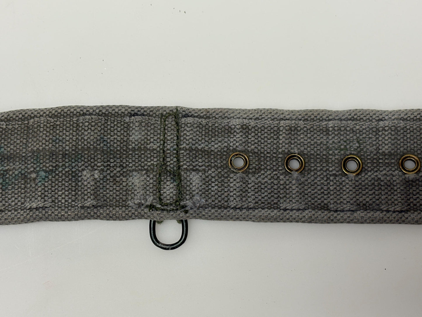 80s vintage real army webbing belt. Thick woven canvas in khaki green. Distressed look. Metal hardware. Fully adjustable. Tactical webbing
