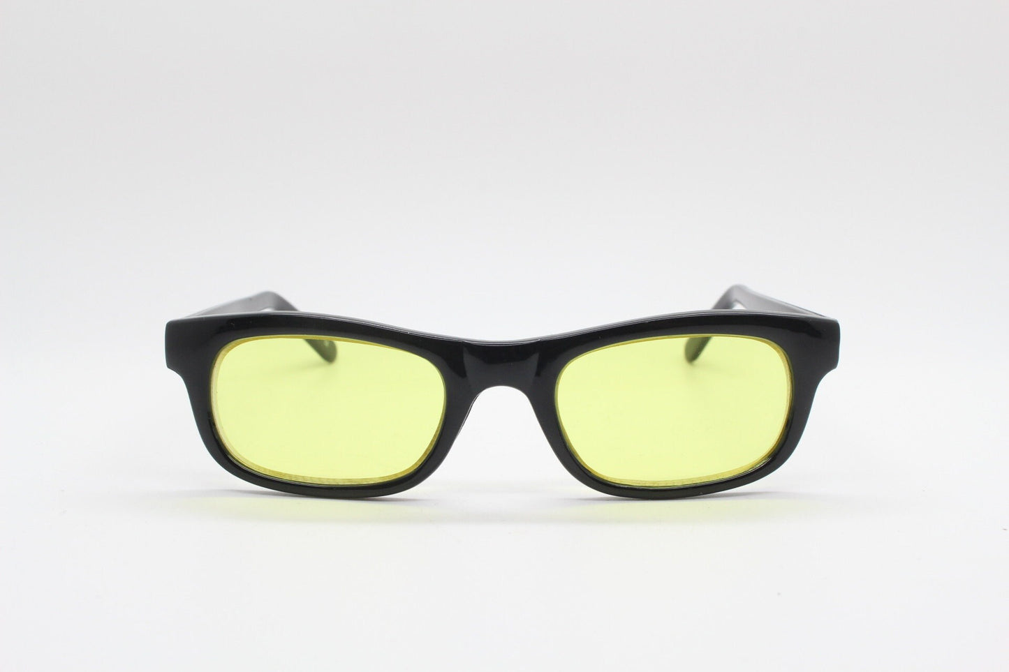 80s vintage rectangular sunglasses. Low profile slim black frame with psychedelic mod light tone canary yellow lenses. BNWT. NOS