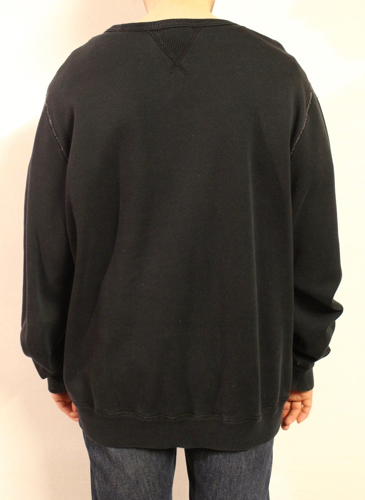 Ralph Lauren Polo Jeans Co. vintage sweatshirt. Black crew neck pullover with distressed US flag patch. Round neck jumper