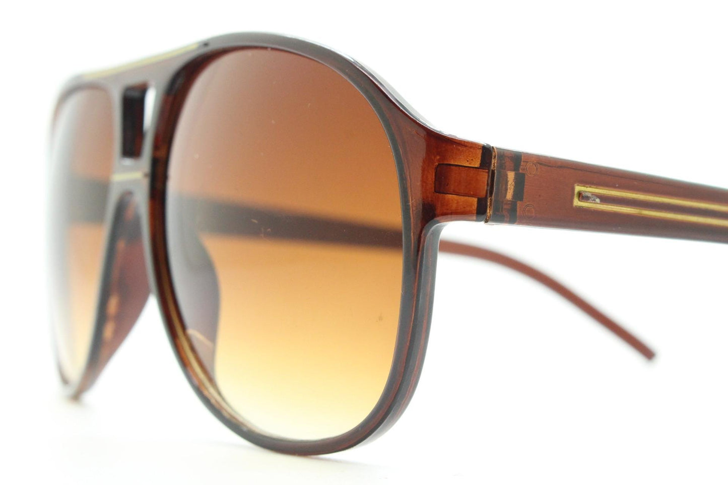 Y2K vintage aviator sunglasses. 2000's transparent brown frame with graduating lenses and gold detail. 70s design. 00's NOS aviators