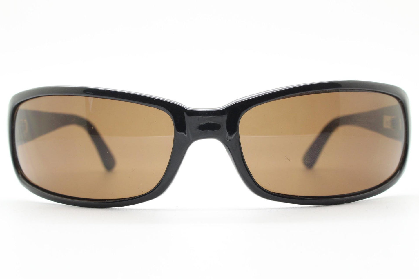 Y2k vintage wrap around rectangular sunglasses. Low profile curved black gloss frame with plain brown lenses. 2000's bug eye. NOS