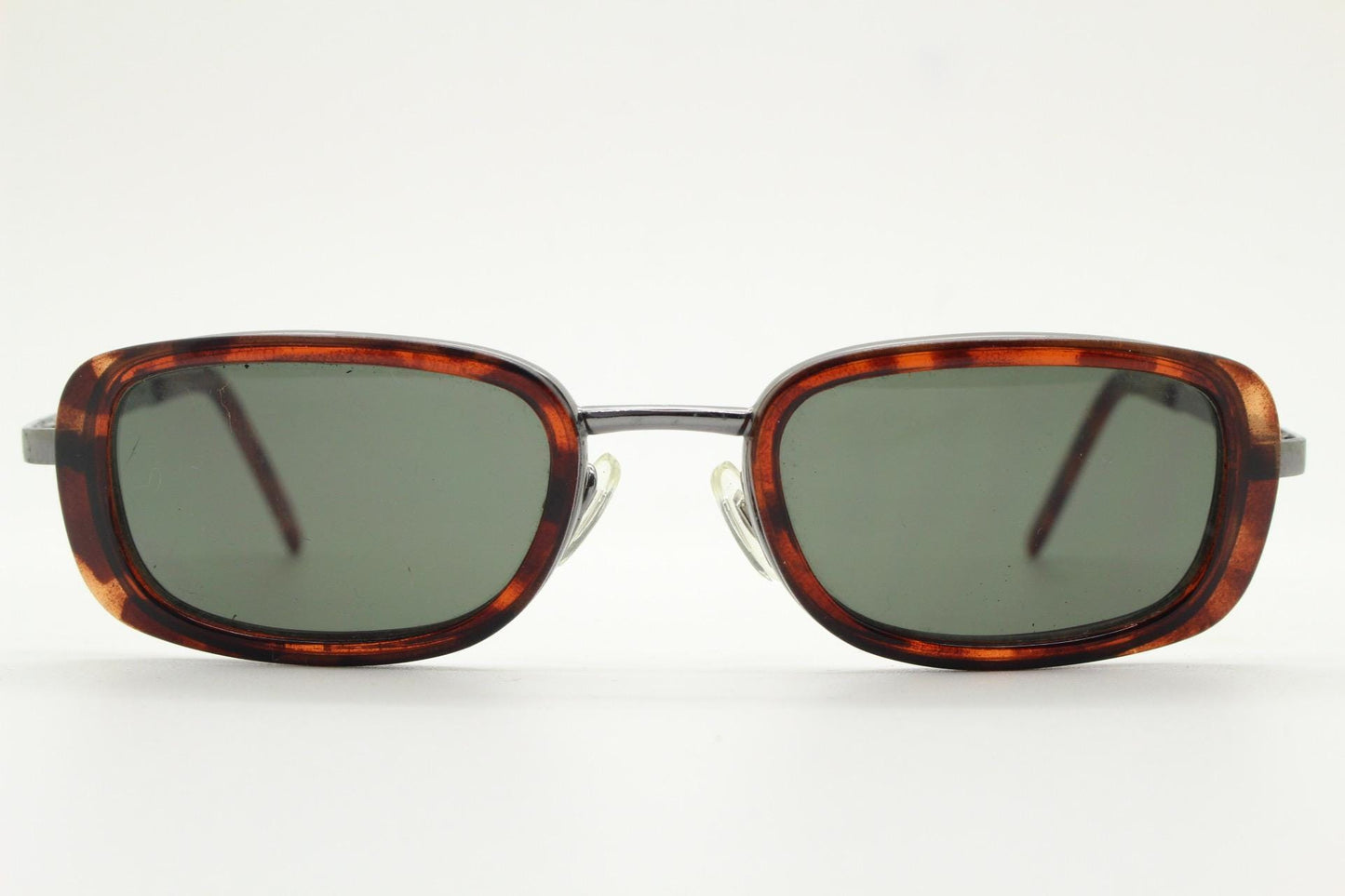 90s vintage rectangular sunglasses. Grey chrome metal frame with protruding tortoise insets, matching ear bends and green lenses