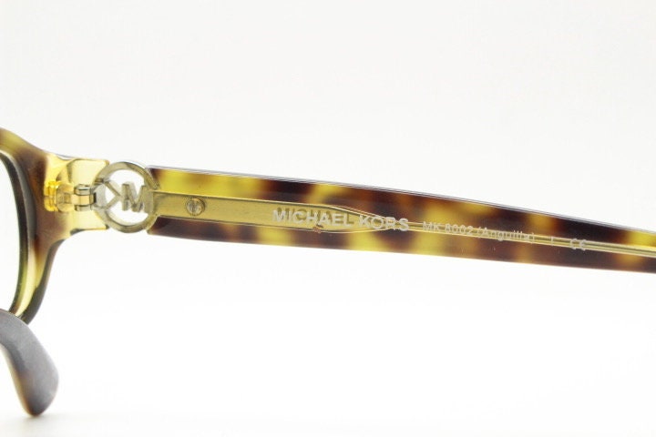 Michael Kors vintage rectangular eye glasses. Tortoise layered acetate low profile cateye optical frame. Womens prescription spectacles