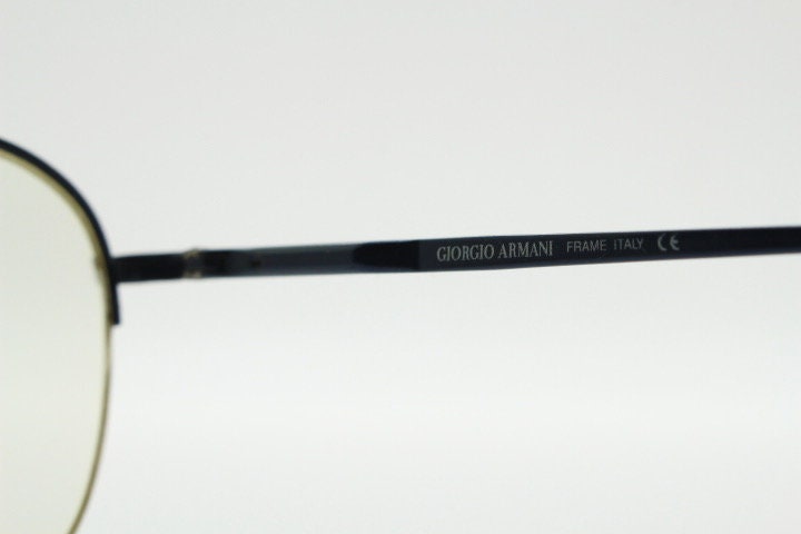 Giorgio Armani round eye glasses made in Italy. Minimal black satin finish half frame spectacles. Prescription optical eyeglasses. RX