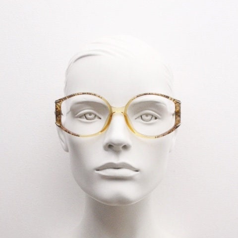 Christian Dior 70s vintage round eye glasses. Transparent honey colour optical frame with abstract gold sparkle patterns. Prescription RX