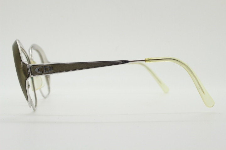 Christian Dior 70s vintage big round eye glasses made in Austria. Silver optical frame with dynamic reflective grey enamel. Prescription RX