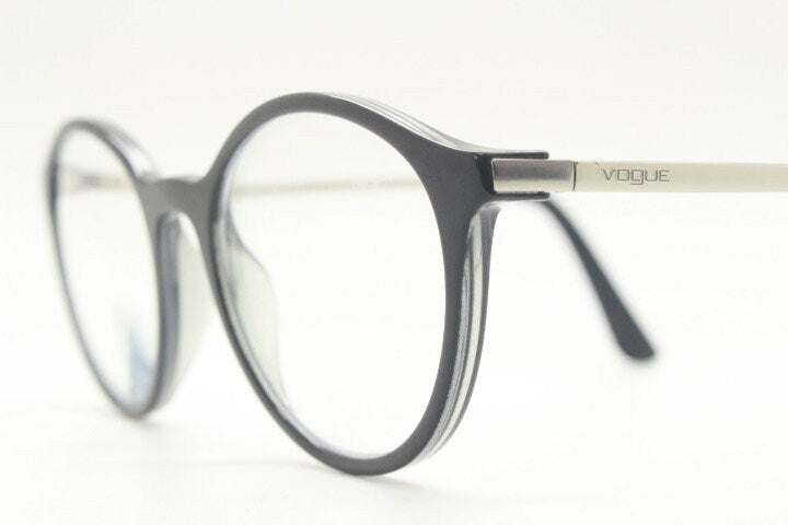 Vogue womens oval eye glasses model 5223. Black acetate optical frames with metal arms. Prescription eyeglasses. RX spectacles
