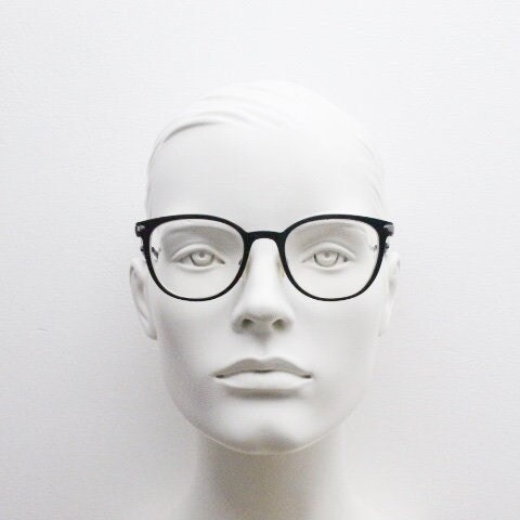Trussardi modified cat eye glasses model VTR023. Womens flat black and gunmetal grey optical frame. Prescription. Vintage spectacles