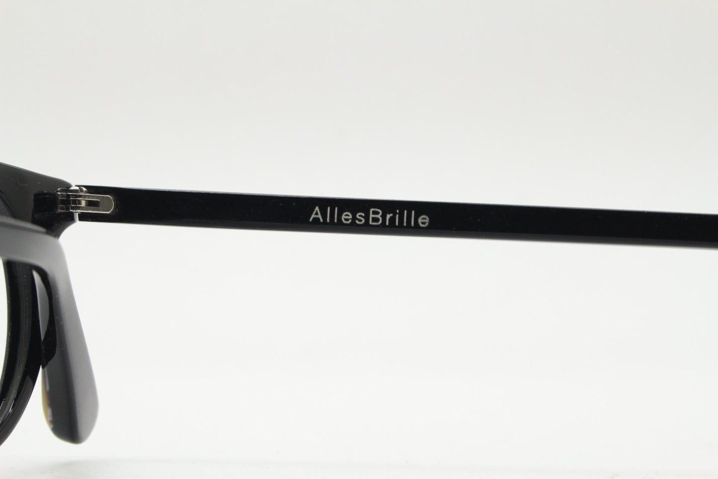 90s vintage oval eye glasses by Alles Brille of Germany. Classical black gloss acetate optical frames with keyhole bridge. RX Spectacles