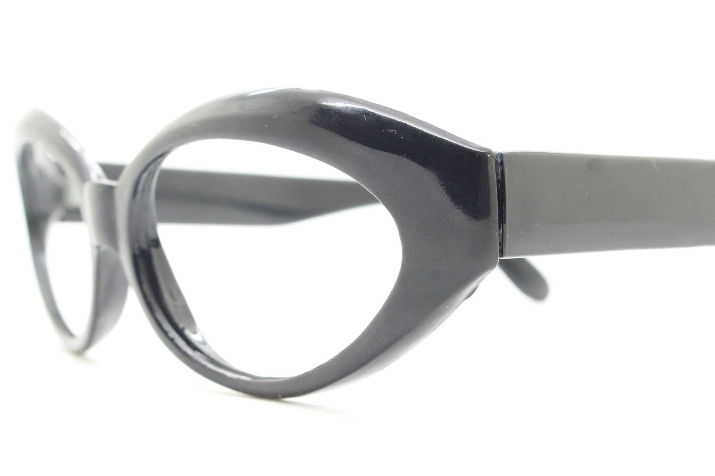 80s vintage oval cat eye glasses. Crop sided dynamic black cateye optical frames. 60s design prescription eyeglasses. RX spectacles. NOS