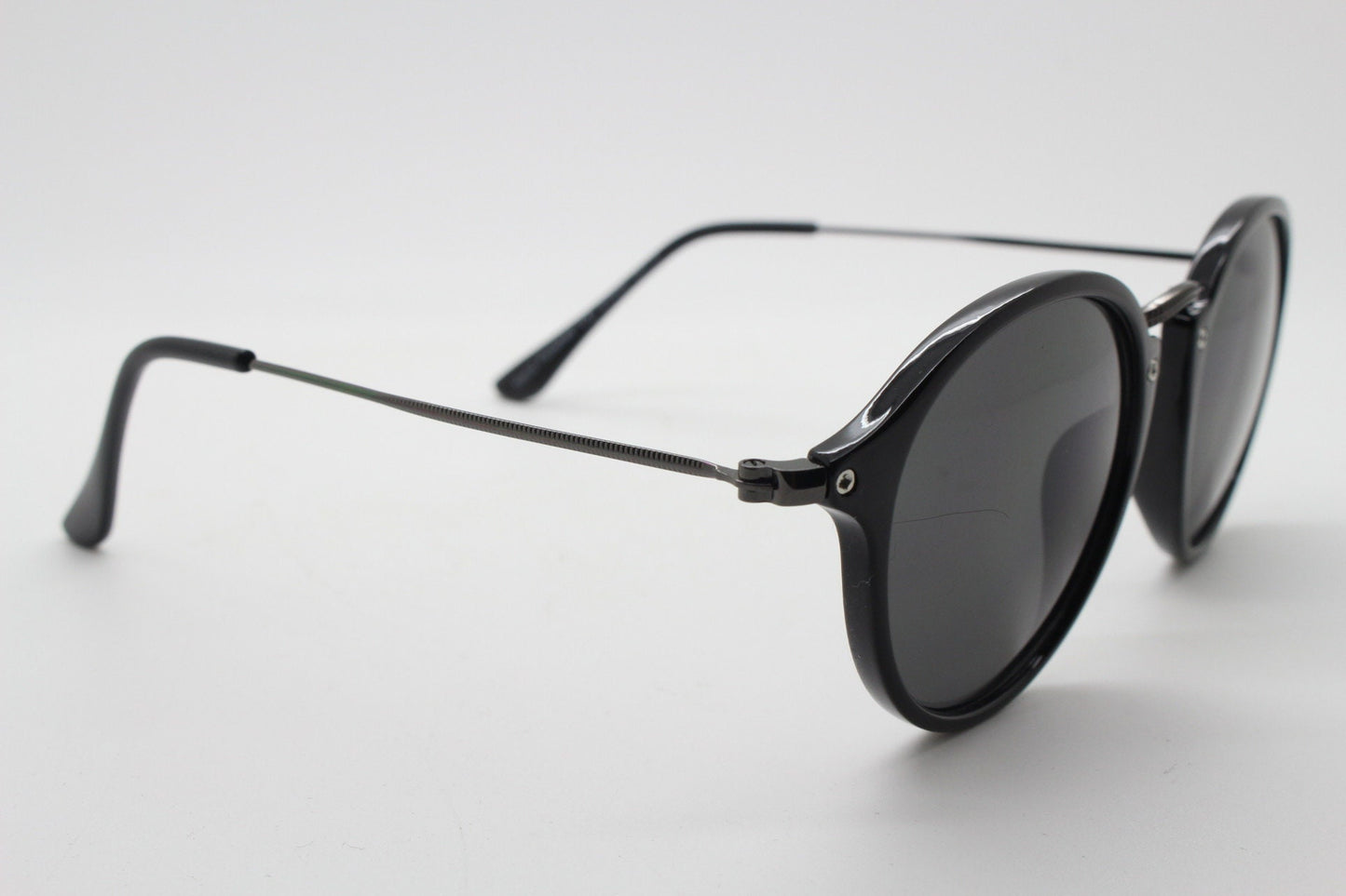 90s vintage round sunglasses. Black gloss slim 30s 40s design frame with metal bridge and dark lenses. Unused NOS