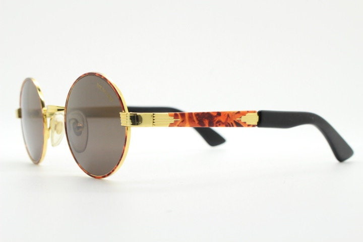 Optical City 90s vintage small round undersized sunglasses made in Italy. Handsome metallic tiger pattern on quality 1920s repro frame. NOS