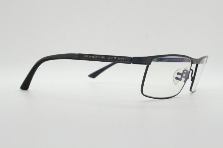 Porsche design rectangular eye glasses model 8251 made in Japan. Minimal gunmetal grey wire optical frame. Prescription RX spectacles