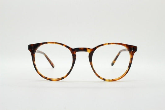 Cubitts vintage round 40s design hand made eye glasses. Honey tortoise acetate optical frame with keyhole bridge. Prescription RX