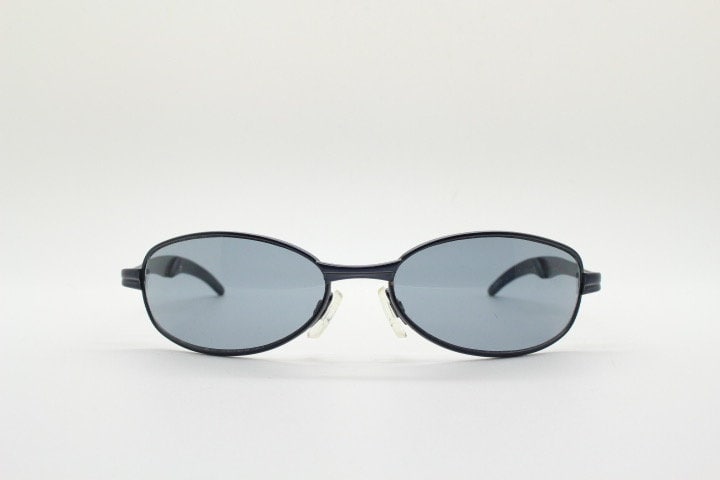 90s vintage oval small bug eye sunglasses. Curved grey satin finish solid metal frame. Rave. Steampunk. Unused NOS