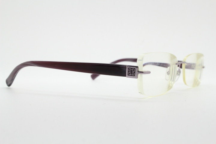 Givenchy rectangular frameless eye glasses made in Italy. Minimal optical frame with marbled brown arms. Prescription RX spectacles. Vintage