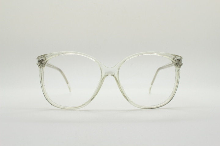 80s vintage oversized round cat eye glasses. Transparent clear crystal optical frame. Prescription RX spectacles. Clean NOS cateye