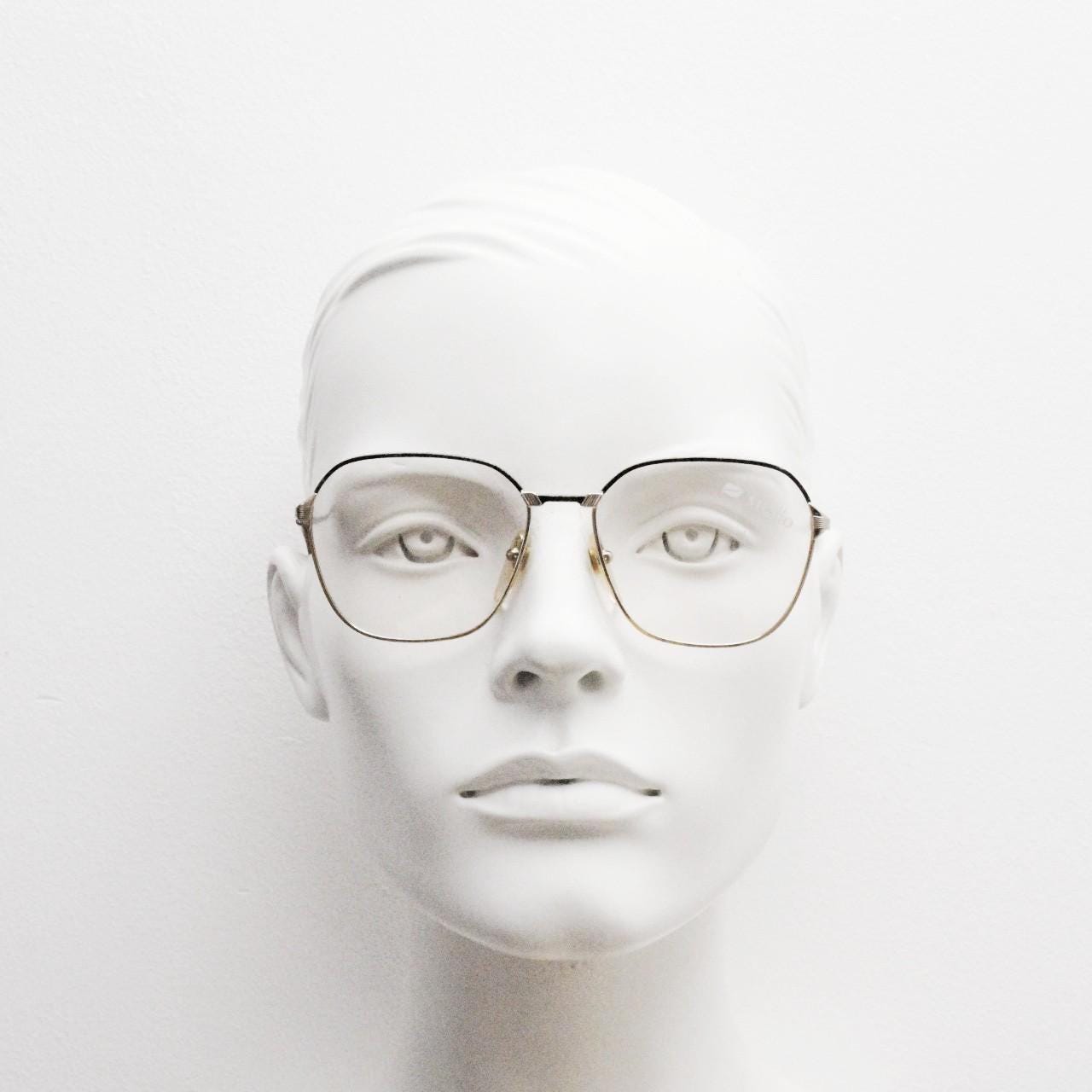 80s vintage square eye glasses made in Italy by Studio. Black and gold patterned metal optical frames in neat proportions. Unused NOS