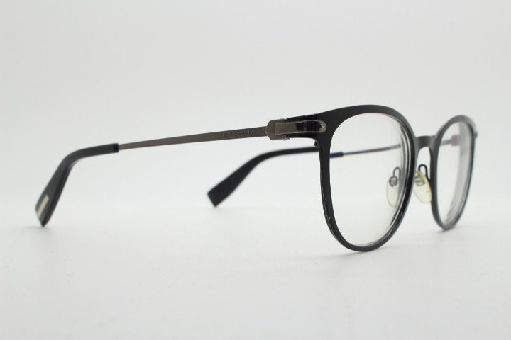 Trussardi modified cat eye glasses model VTR023. Womens flat black and gunmetal grey optical frame. Prescription. Vintage spectacles
